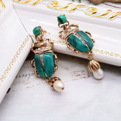 "Crescinia" Beetle Earrings width=100 