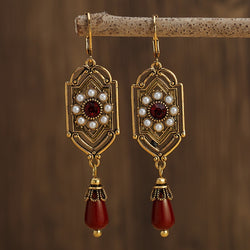 Serpent's Embrace Earrings width=100 