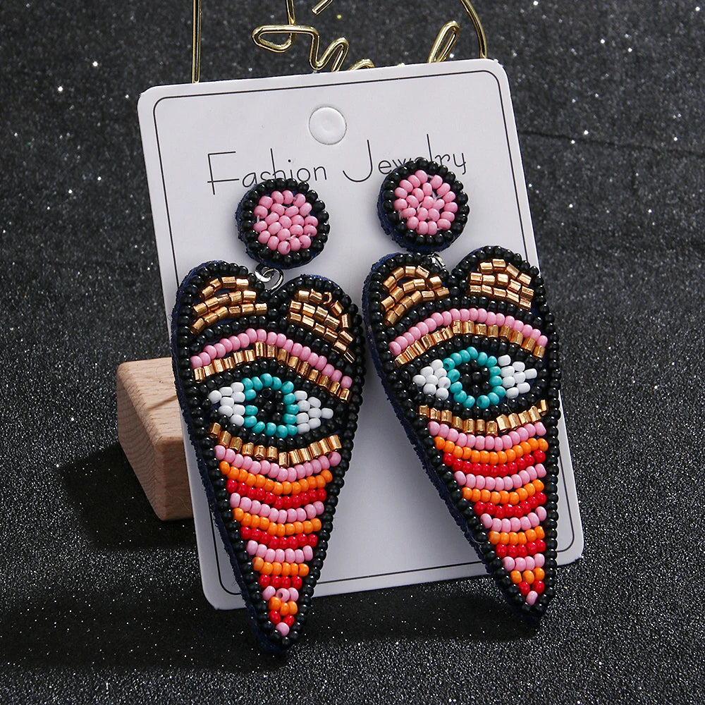 "Khensetra" Eye Heart Drop Earrings