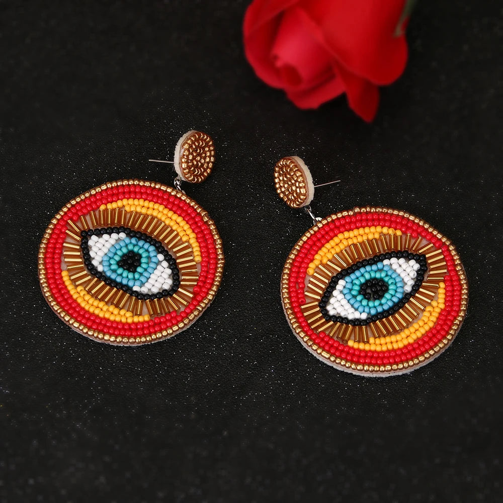 "Khensetra" Eye Heart Drop Earrings
