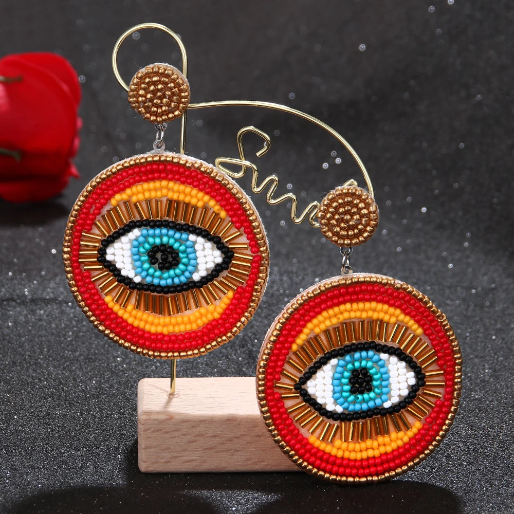 "Khensetra" Eye Heart Drop Earrings