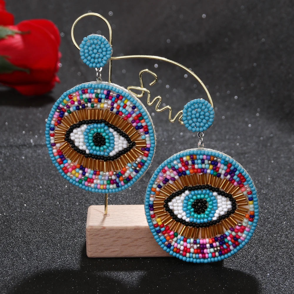 "Khensetra" Eye Heart Drop Earrings