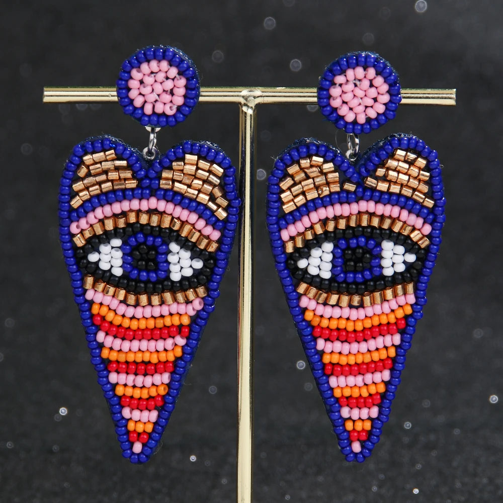 "Khensetra" Eye Heart Drop Earrings