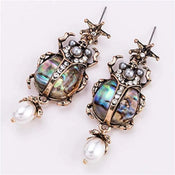 "Tacita" Beetle Shell Earrings width=100 